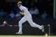 SYDNEY, AUSTRALIA - NOVEMBER 13: Stuart Broad of England runs into bowl during day one of the tour match between the CA Invitational XI and England at the Sydney Cricket Ground on November 13, 2013 in Sydney, Australia. (Photo by Gareth Copley/Getty Images)