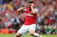 LONDON, ENGLAND - SEPTEMBER 01: Olivier Giroud of Arsenal reacts to a missed opportunity the Barclays Premier League match between Arsenal and Tottenham Hotspur at Emirates Stadium on September 01, 2013 in London, England. (Photo by Clive Mason/Getty Images)