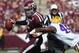 COLLEGE STATION, TX - OCTOBER 20: Johnny Manziel #2 of the Texas A&M Aggies runs the ball against Deion Jones #45 of the LSU Tigers at Kyle Field on October 20, 2012 in College Station, Texas. (Photo by Ronald Martinez/Getty Images)