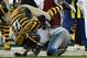 Nov 17, 2013; Pittsburgh, PA, USA; Pittsburgh Steelers quarterback Ben Roethlisberger (7) is hit by Detroit Lions safety Don Carey (32) during the second half at Heinz Field. Pittsburgh won the game, 37-27. Mandatory Credit: Jason Bridge-USA TODAY Sports