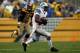 Nov 17, 2013; Pittsburgh, PA, USA; Detroit Lions running back Reggie Bush (21) runs the ball against the Pittsburgh Steelers during the first quarter at Heinz Field. Mandatory Credit: Jason Bridge-USA TODAY Sports