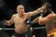 Nov 16, 2013; Las Vegas, NV, USA; Georges St-Pierre (red gloves) fights against Johny Hendricks (blue gloves) in their welterweight championship bout during UFC 167 at MGM Grand Garden Arena. Mandatory Credit: Stephen R. Sylvanie-USA TODAY Sports