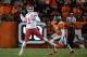November 17, 2013; Denver, CO, USA; Kansas City Chiefs quarterback Alex Smith (11) passes the football against Denver Broncos cornerback Chris Harris (25) during the second quarter at Sports Authority Field at Mile High. Mandatory Credit: Kyle Terada-USA TODAY Sports