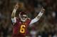LOS ANGELES, CA - NOVEMBER 16: Quarterback Cody Kessler #6 of the USC Trojans celebrates after kicker Andre Heidari (not pictured) of the USC Trojans kicked the go ahead field goal in the closing seconds of the game against the Stanford Cardinal at Los Angeles Coliseum on November 16, 2013 in Los Angeles, California. USC defeated Stanford 20-17. (Photo by Jeff Gross/Getty Images)