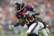 Nov 17, 2013; Houston, TX, USA; Houston Texans receiver Andre Johnson (80) is pursued by Oakland Raiders cornerback Mike Jenkins (21) at Reliant Stadium. The Raiders defeated the Texans 28-23. Mandatory Credit: Kirby Lee-USA TODAY Sports
