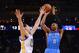 November 14, 2013; Oakland, CA, USA; Oklahoma City Thunder point guard Russell Westbrook (0) shoots the ball against Golden State Warriors shooting guard Klay Thompson (11) during the first quarter at Oracle Arena. Mandatory Credit: Kyle Terada-USA TODAY Sports