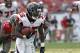 Nov 17, 2013; Tampa, FL, USA; Atlanta Falcons running back Antone Smith (35) runs the ball in for a touchdown against the Atlanta Falcons during the second half at Raymond James Stadium. Tampa Bay Buccaneers defeated the Atlanta Falcons 41-28. Mandatory Credit: Kim Klement-USA TODAY Sports