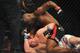 Nov 16, 2013; Las Vegas, NV, USA; Rashad Evans (red gloves) fights against Chael Sonnen (blue gloves) in their light heavyweight bout during UFC 167 at MGM Grand Garden Arena. Mandatory Credit: Stephen R. Sylvanie-USA TODAY Sports