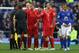 LIVERPOOL, ENGLAND - OCTOBER 28: Luis Suarez of Liverpool and his team-mates protest to Referee Andre Marriner at the end of the Barclays Premier League match between Everton and Liverpool at Goodison Park on October 28, 2012 in Liverpool, England. (Photo by Clive Brunskill/Getty Images)
