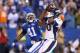 INDIANAPOLIS, IN - OCTOBER 20: Julius Thomas #80 of the Denver Broncos catches a touchdown pass in front of Antoine Bethea #41 of the Indianapolis Colts at Lucas Oil Stadium on October 20, 2013 in Indianapolis, Indiana. (Photo by Andy Lyons/Getty Images)