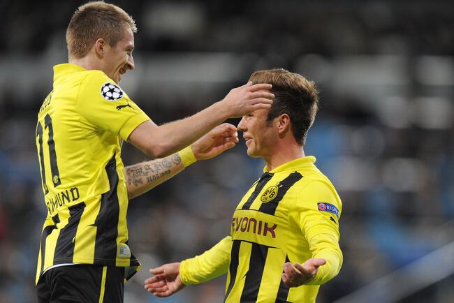 Hi-res-155672479-mario-gotze-of-of-borussia-dortmund-celebrates-with_crop_north