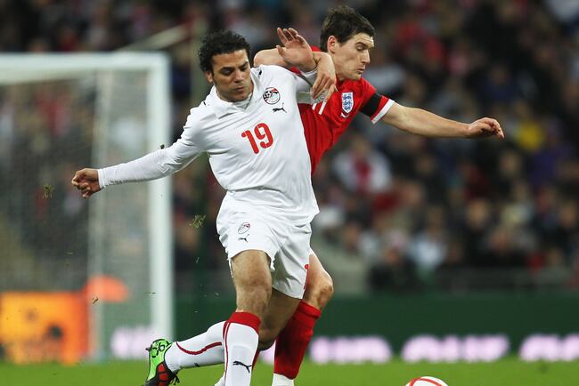 Hi-res-97409317-gareth-barry-of-england-battles-with-amr-zaki-of-egypt_crop_north