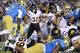 PASADENA, CA - NOVEMBER 05: Quarterback Brock Osweiler #17 of the Arizona State Sun Devils dives for a touchdown on a one yard quarterback sneak in the fouth quarter against the UCLA Bruins at the Rose Bowl on November 5, 2011 in Pasadena, California. UCLA won 29-28. (Photo by Stephen Dunn/Getty Images)