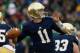 SOUTH BEND, IN - NOVEMBER 02: Tommy Rees #11 of the Notre Dame Fighting Irish passes against the Navy Midshipmen at Notre Dame Stadium on November 2, 2013 in South Bend, Indiana. (Photo by Jonathan Daniel/Getty Images)