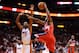 Nov 3, 2013; Miami, FL, USA; Washington Wizards power forward Trevor Booker (35) drives to the basket as Miami Heat center Chris Bosh (1) defends during the first period at American Airlines Arena. Mandatory Credit: Steve Mitchell-USA TODAY Sports