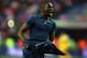 PARIS, FRANCE - NOVEMBER 19: Mamadou Sakho of France celebrates after winning the FIFA 2014 World Cup Qualifier Play-off second leg match between France and Ukraine at the Stade de France on November 19, 2013 in Paris, France. (Photo by Bryn Lennon/Getty Images)