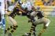 Nov 17, 2013; Pittsburgh, PA, USA; Pittsburgh Steelers safety Will Allen (20) and safety Ryan Clark (25) tackle Detroit Lions running back Reggie Bush (21) during the first half at Heinz Field. Mandatory Credit: Jason Bridge-USA TODAY Sports