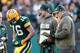 GREEN BAY, WI - NOVEMBER 10: Scott Tolzien #16 of the Green Bay Packers talks with Aaron Rodgers and head coach Mike McCarthy during a fourth quarter time out while playing the Philadelphia Eagles at Lambeau Field on November 10, 2013 in Green Bay, Wisconsin. Philadelphia won the game 27-13. (Photo by Gregory Shamus/Getty Images)
