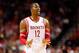 Nov 16, 2013; Houston, TX, USA; Houston Rockets center Dwight Howard (12) reacts during the second half against the Denver Nuggets at Toyota Center. The Rockets won 122-111. Mandatory Credit: Soobum Im-USA TODAY Sports