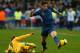 PARIS, FRANCE - NOVEMBER 19: Olivier Giroud of France is tackled by Oleg Guslev of Ukraine during the FIFA 2014 World Cup Qualifier 2nd Leg Playoff between France and Ukraine at the Stade de France on November 19, 2013 in Paris, France. (Photo by Harry Engels/Getty Images)