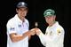 Alastair Cook and Michael Clarke pose with the Urn prior to the first Test in Brisbane.