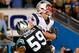 CHARLOTTE, NC - NOVEMBER 18: Rob Gronkowski #87 of the New England Patriots and Luke Kuechly #59 of the Carolina Panthers fight for the ball in the end zone on the last play of the game at Bank of America Stadium on November 18, 2013 in Charlotte, North Carolina. (Photo by Streeter Lecka/Getty Images)