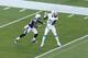 MIAMI GARDENS, FL - NOVEMBER 17: Mike Wallace #11 of the Miami Dolphins catches the ball in front of Shareece Wright #29 of the San Diego Chargers on November 17, 2013 at Sun Life Stadium in Miami Gardens, Florida. (Photo by Joel Auerbach/Getty Images)