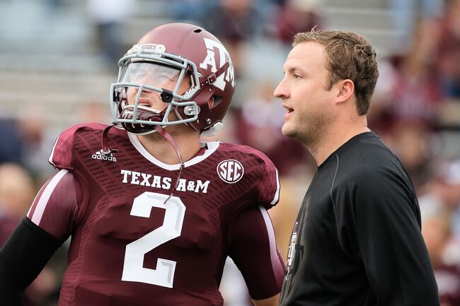 Hi-res-187750849-johnny-manziel-of-the-texas-a-m-aggies-chats-with-his_crop_north