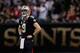 NEW ORLEANS, LA - NOVEMBER 17: Drew Brees #9 of the New Orleans Saints waits for a play between downs against the San Francisco 49ers at Mercedes-Benz Superdome on November 17, 2013 in New Orleans, Louisiana. (Photo by Kevin C. Cox/Getty Images)