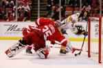 Hi-res-450666305-jimmy-howard-of-the-detroit-red-wings-makes-a-diving_crop_north