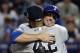 Jul 16, 2013; Flushing, NY, USA; American League pitcher Joe Nathan (36) of the Texas Rangers hugs pitcher Mariano Rivera (42) of the New York Yankees after the 2013 All Star Game at Citi Field. Mandatory Credit: Robert Deutsch-USA TODAY Sports