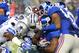 ARLINGTON, TX - SEPTEMBER 08: Kick returner Michael Cox #29 of the New York Giants is tackled in the second quarter against the Dallas Cowboys on September 8, 2013 at AT&T Stadium in Arlington, Texas. (Photo by Ronald Martinez/Getty Images)