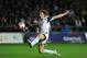 SWANSEA, WALES - OCTOBER 24: Swansea player Michu scores the opening goal during the UEFA Europa League Group A match between Swansea City and FC Kuban Krasnodar at Liberty Stadium on October 24, 2013 in Swansea, Wales. (Photo by Stu Forster/Getty Images)