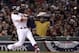 Oct 23, 2013; Boston, MA, USA; Boston Red Sox first baseman Mike Napoli hits a three-run double against the St. Louis Cardinals during the first inning during game one of the MLB baseball World Series at Fenway Park. Mandatory Credit: Robert Deutsch-USA TODAY Sports