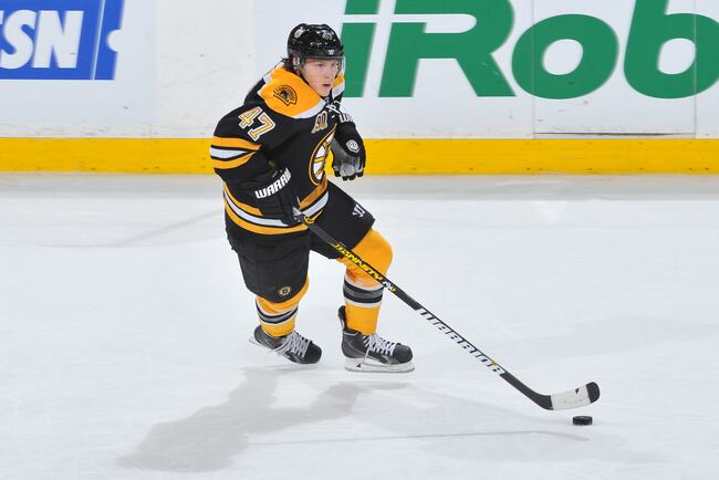 Hi-res-450403767-torey-krug-of-the-boston-bruins-skates-with-the-puck_crop_north