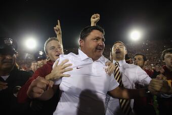 Hi-res-450133647-trojans-interim-head-coach-ed-orgeron-celebrates-the_crop_north