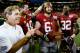 ATLANTA, GA - AUGUST 31: Anthony Steen #61 of the Alabama Crimson Tide wears the leather helmet as he celebrates their 35-10 win over the Virginia Tech Hokies with Nick Saban, AJ McCarron #10, and C.J. Mosley #32 at Georgia Dome on August 31, 2013 in Atlanta, Georgia. (Photo by Kevin C. Cox/Getty Images)