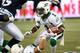 TORONTO, CANADA - JULY 11: Kory Sheets #1 of the Saskatchewan Roughriders carries the ball during CFL game action against the Toronto Argonauts on July 11, 2013 at Rogers Centre in Toronto, Ontario, Canada. (Photo by Tom Szczerbowski/Getty Images)