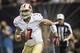 NEW ORLEANS, LA - NOVEMBER 17: Colin Kaepernick #7 of the San Francisco 49ers scrambles with the ball during a game against the New Orleans Saints at Mercedes-Benz Superdome on November 17, 2013 in New Orleans, Louisiana. The Saints defeated the 49ers 23-20. (Photo by Wesley Hitt/Getty Images)