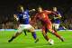 LIVERPOOL, ENGLAND - MARCH 13: Phil Jagielka of Everton tackles Luis Suarez of Liverpool during the Barclays Premier League match between Liverpool and Everton at Anfield on March 13, 2012 in Liverpool, England. (Photo by Jamie McDonald/Getty Images)