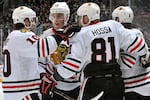 Hi-res-451263267-patrick-sharp-jonathan-toews-marian-hossa-and-duncan_crop_north
