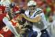 KANSAS CITY, MO - OCTOBER 31: Quarterback Philip Rivers #17 of the San Diego Chargers gets sacked during the second quarter against the Kansas City Chiefs on October 31, 2011 at Arrowhead Stadium in Kansas City, Missouri. (Photo by Peter Aiken/Getty Images)