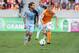 Nov 9, 2013; Houston, TX, USA; Sporting KC midfielder/forward Graham Zusi (8) and Houston Dynamo midfielder Andrew Driver (20) run towards the ball during the MLS Eastern Conference Championship soccer game at BBVA Compass Stadium. Mandatory Credit: Troy Taormina-USA TODAY Sports