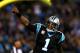 CHARLOTTE, NC - NOVEMBER 18: Cam Newton #1 of the Carolina Panthers reacts after throwing for a touchdown against the New England Patriots during their game at Bank of America Stadium on November 18, 2013 in Charlotte, North Carolina. (Photo by Streeter Lecka/Getty Images)