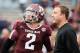 COLLEGE STATION, TX - NOVEMBER 09: Johnny Manziel #2 of the Texas A&M Aggies chats with his quarterback coach Jake Spavital before the game against the Mississippi State Bulldogs at Kyle Field on November 9, 2013 in College Station, Texas. (Photo by Scott Halleran/Getty Images)