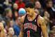 Nov 21, 2013; Denver, CO, USA; Chicago Bulls guard Derrick Rose (1) and forward Taj Gibson (22) during the second half against the Denver Nuggets at Pepsi Center. The Nuggets won 97-87. Mandatory Credit: Chris Humphreys-USA TODAY Sports