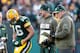 GREEN BAY, WI - NOVEMBER 10: Scott Tolzien #16 of the Green Bay Packers talks with Aaron Rodgers and head coach Mike McCarthy during a fourth quarter time out while playing the Philadelphia Eagles at Lambeau Field on November 10, 2013 in Green Bay, Wisconsin. Philadelphia won the game 27-13. (Photo by Gregory Shamus/Getty Images)