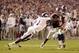 Nov 9, 2013; College Station, TX, USA; Mississippi State Bulldogs defensive back Nickoe Whitley (1) tackles Texas A&M Aggies quarterback Johnny Manziel (2) during the second half at Kyle Field. Texas A&M won 51-41. Mandatory Credit: Thomas Campbell-USA TODAY Sports