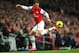 LONDON, ENGLAND - NOVEMBER 23: Mesut Oezil of Arsenal controls the ball during the Barclays Premier League match between Arsenal and Southampton at Emirates Stadium on November 23, 2013 in London, England. (Photo by Clive Rose/Getty Images)