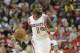 HOUSTON, TX - NOVEMBER 01: Aaron Brooks #0 of the Houston Rockets brings the ball up the court against the Dallas Mavericks at Toyota Center on November 1, 2013 in Houston, Texas. NOTE TO USER: User expressly acknowledges and agrees that, by downloading and or using this photograph, User is consenting to the terms and conditions of the Getty Images License Agreement. (Photo by Bob Levey/Getty Images)